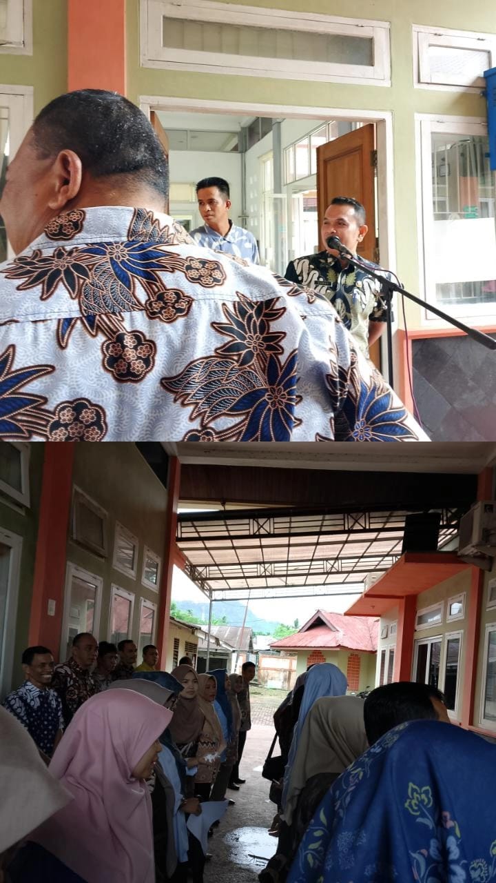 KABID PENYULUHAN SEBAGAI PEMIMPIN APEL PAGI DI DINAS PERTANIAN KAB. PESISIR SELATAN